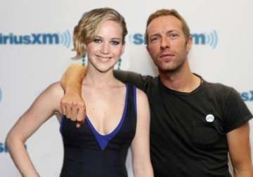chris martin to join jennifer lawrence at film premiere