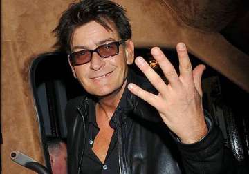 charlie sheen sued for sexual assault