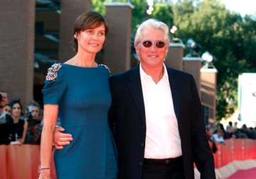 carey lowell wants fare share in richard gere s fortune