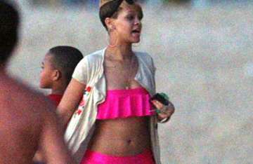 rihanna in stunning frilly pink bikini in barbados