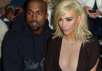 kim kardashian steals attention with mesh dress