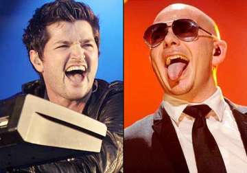 pitbull criticized for his meaningless songs by the script band