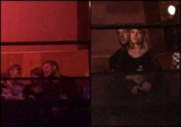 taylor swift beau calvin harris spotted in romantic embrace