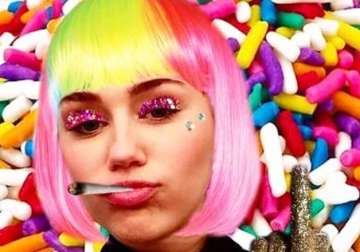 miley cyrus flaunts raunchy images see pics