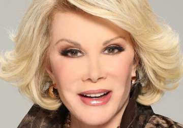 joan rivers to be buried with red carpet