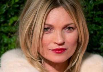 kate moss spends 100 000 pounds on neon sign