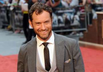 jude law satisfied how his children s life turning out