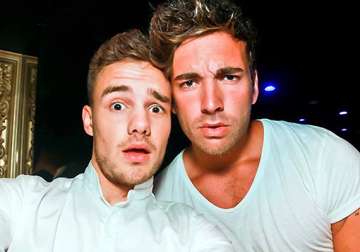 injured friend s family grateful to liam payne