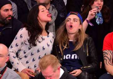 it s confirmed michelle rodriguez is dating cara delevingne