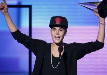 justin bieber apologised to bill clinton report