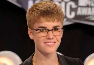 justin bieber s haircut cost toy maker 100 000