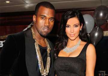 kanye west doesn t want to take baby north along on honeymoon