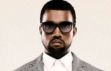 kanye west loses temper with paparazzi