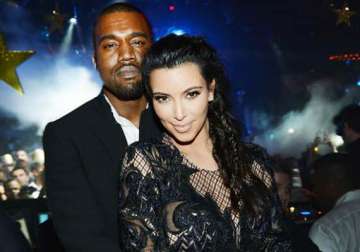 kanye not sure about documenting kim s pregnancy