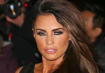 katie price fears fame affecting her son junior