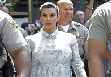 kim kardashian appears in court flanked by 10 us county sheriffs