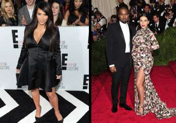 kim kardashian s shows off baby bump in floral gown view pics