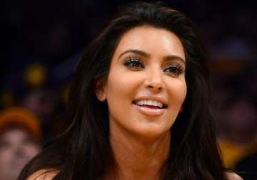 kim spends thousands for first child
