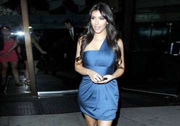kim kardashian celebrates national cleavage day in daring low cut dress