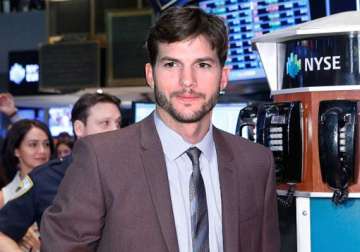 kutcher rings nyse opening bell to promote jobs biopic