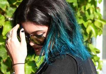 kylie jenner s blue locks give family the blues