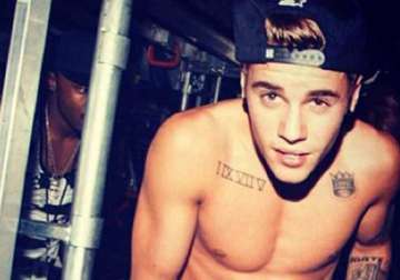 lawyers fight to keep justin bieber s semi nude photos private