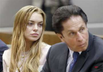 lindsay lohan booked then released as a formality