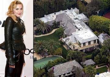 madonna sells beverly hills mansion