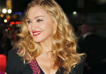 madonna talks musicality of w.e.