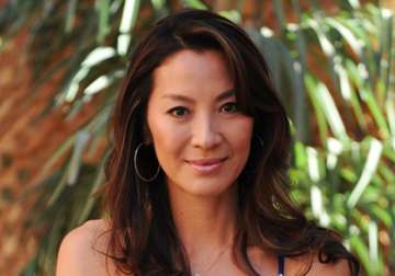 michelle yeoh slots into lead in the lady