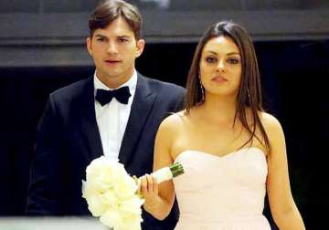 mila kunis attends ashton kutcher s brother s wedding