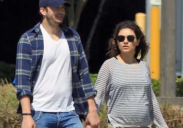 finally mila kunis opens up about pregnancy see pics