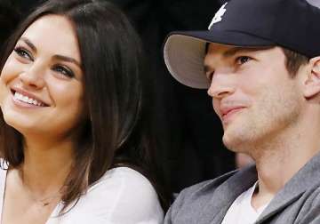 is kunis expecting first child with fiance kutcher