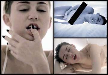 miley cyrus s new video leaked online see pics watch video