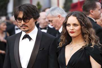 my relationship with vanessa paradis is not over says johnny depp