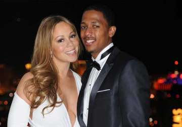 nick cannon praises wife mariah s pet care habit