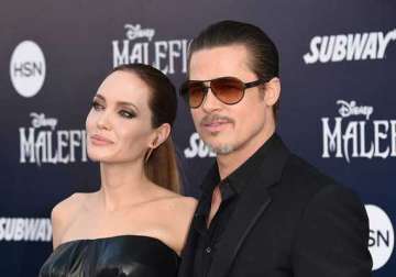 omg brad pitt gets punched at maleficent premiere