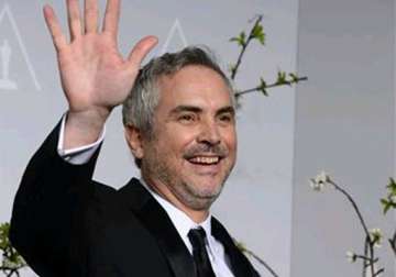 oscars 2014 alfonso cuaron wins best director oscar for gravity