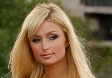 paris hilton shows charitable side in colombia