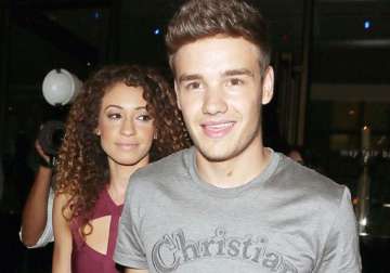 payne chooses girlfriend over band