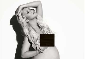 pregnant christina aguilera goes nude for v magazine