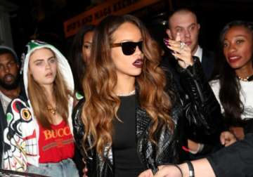 rihanna delevingne bond well on luxury holiday