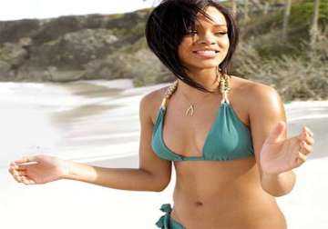 rihanna s beach time spoilt by fans