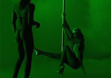 rihanna takes pole dancing lessons view pics