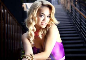 rita ora gets dove tattoo