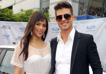 robin thicke praises estranged wife patton