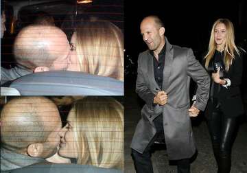 locking lips in a taxi rosie huntington jason statham spark off steamy romance see pics