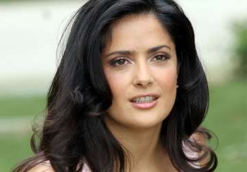 salma hayek says happiness makes her suited to comedy