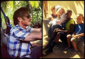 sean penn madonna spend time together in haiti see pics