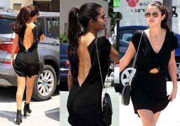 oop selena gomez suffers wardrobe malfunction